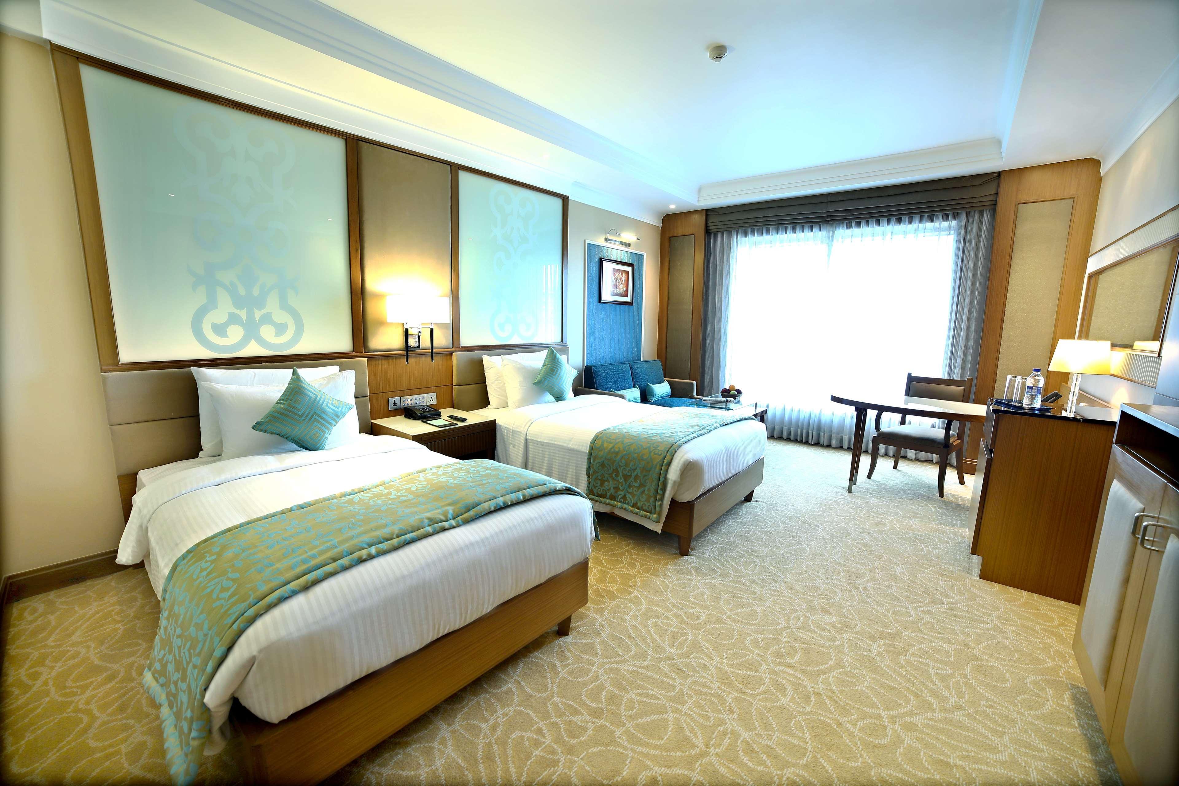 فندق Ramada Plaza شيناي المظهر الخارجي الصورة Deluxe Room