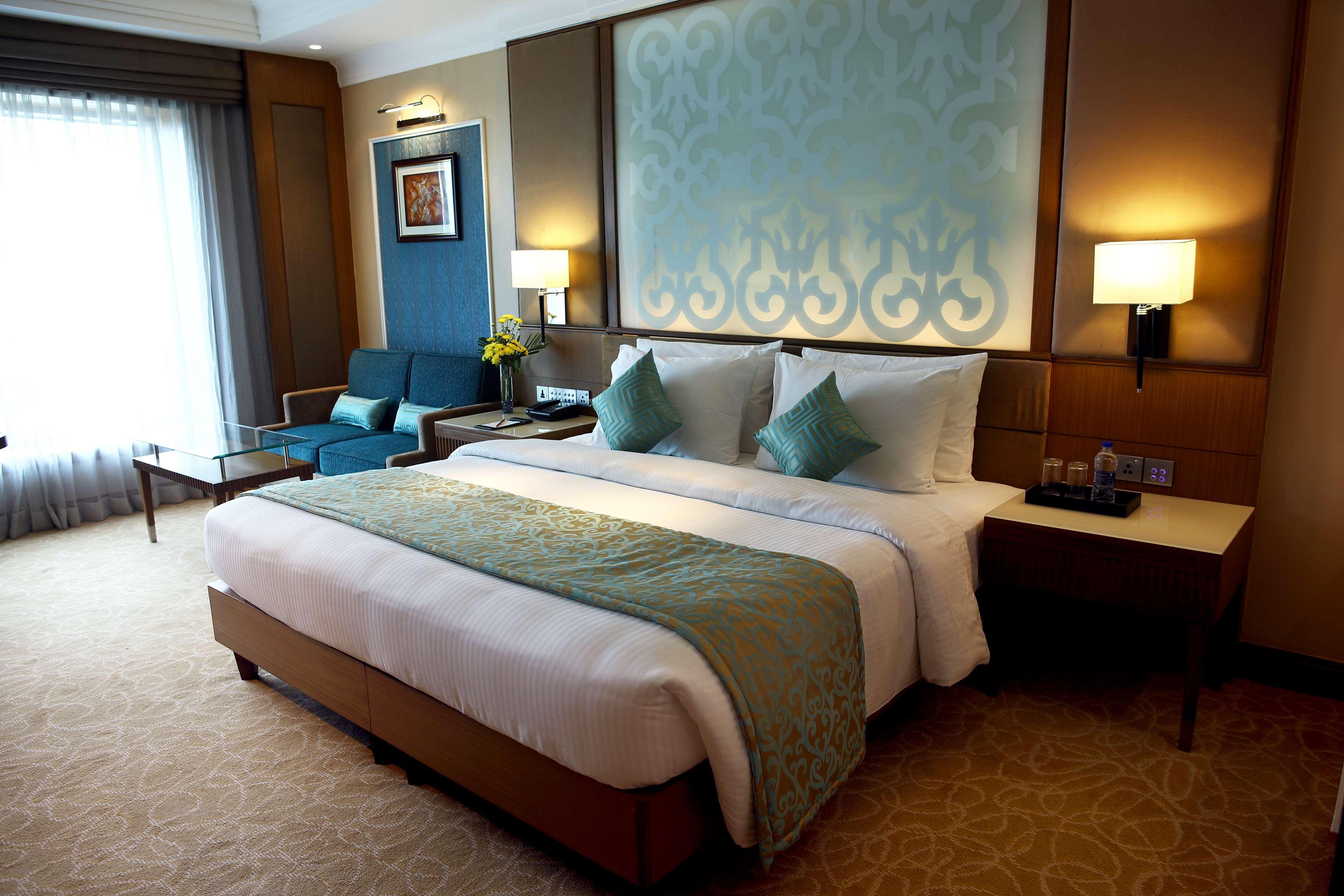 فندق Ramada Plaza شيناي المظهر الخارجي الصورة Deluxe Room