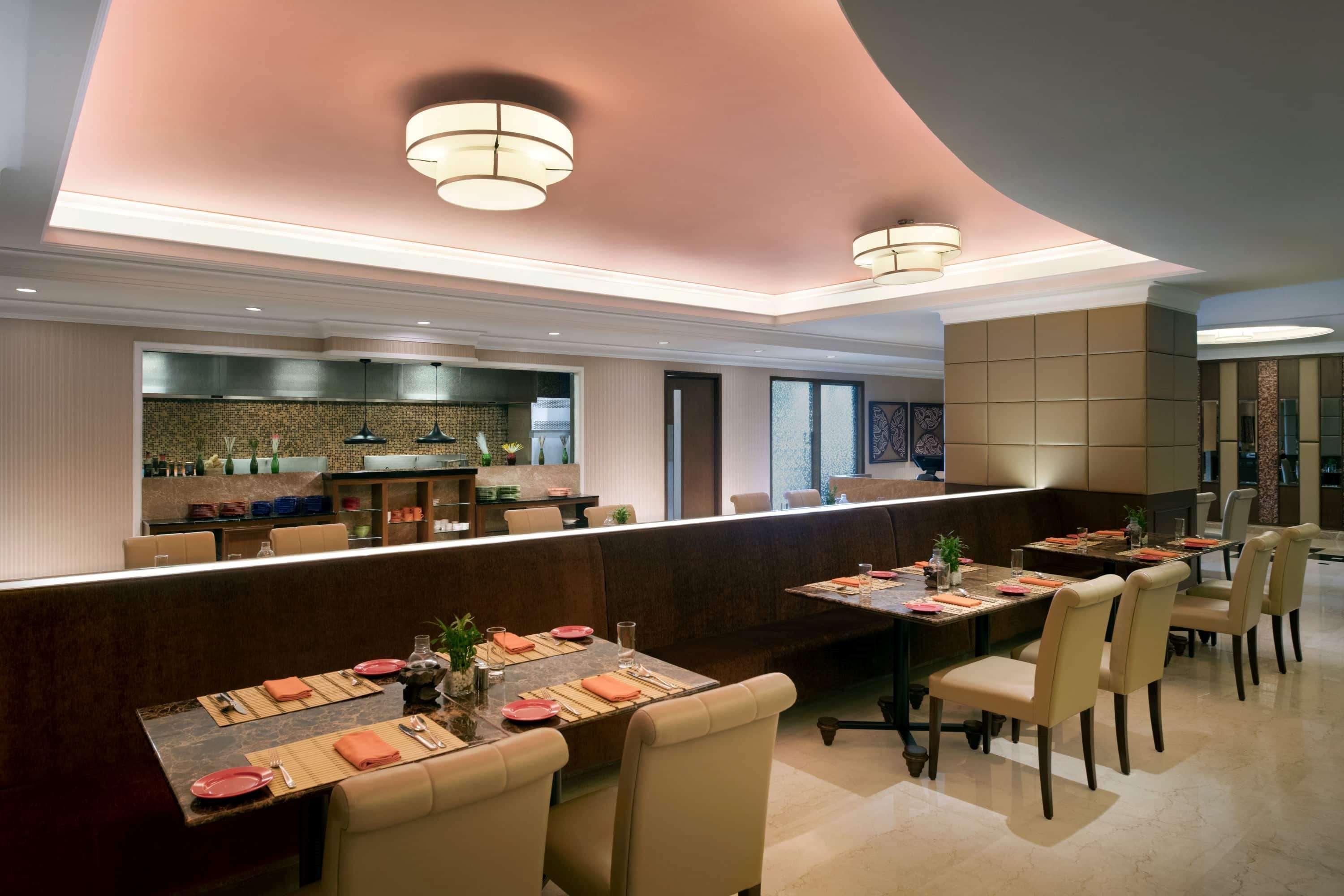 فندق Ramada Plaza شيناي المظهر الخارجي الصورة The restaurant