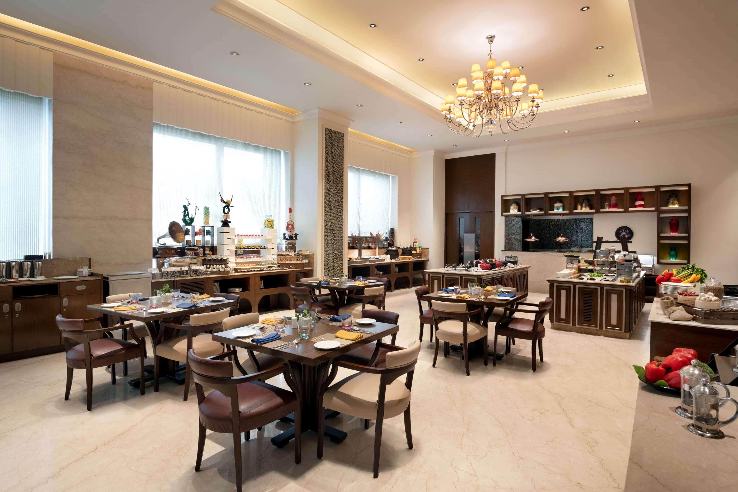 فندق Ramada Plaza شيناي المظهر الخارجي الصورة The restaurant