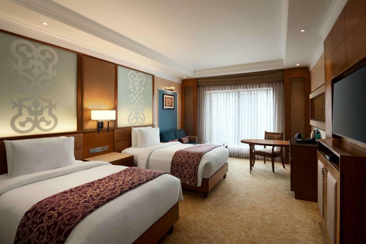 فندق Ramada Plaza شيناي المظهر الخارجي الصورة Deluxe Room
